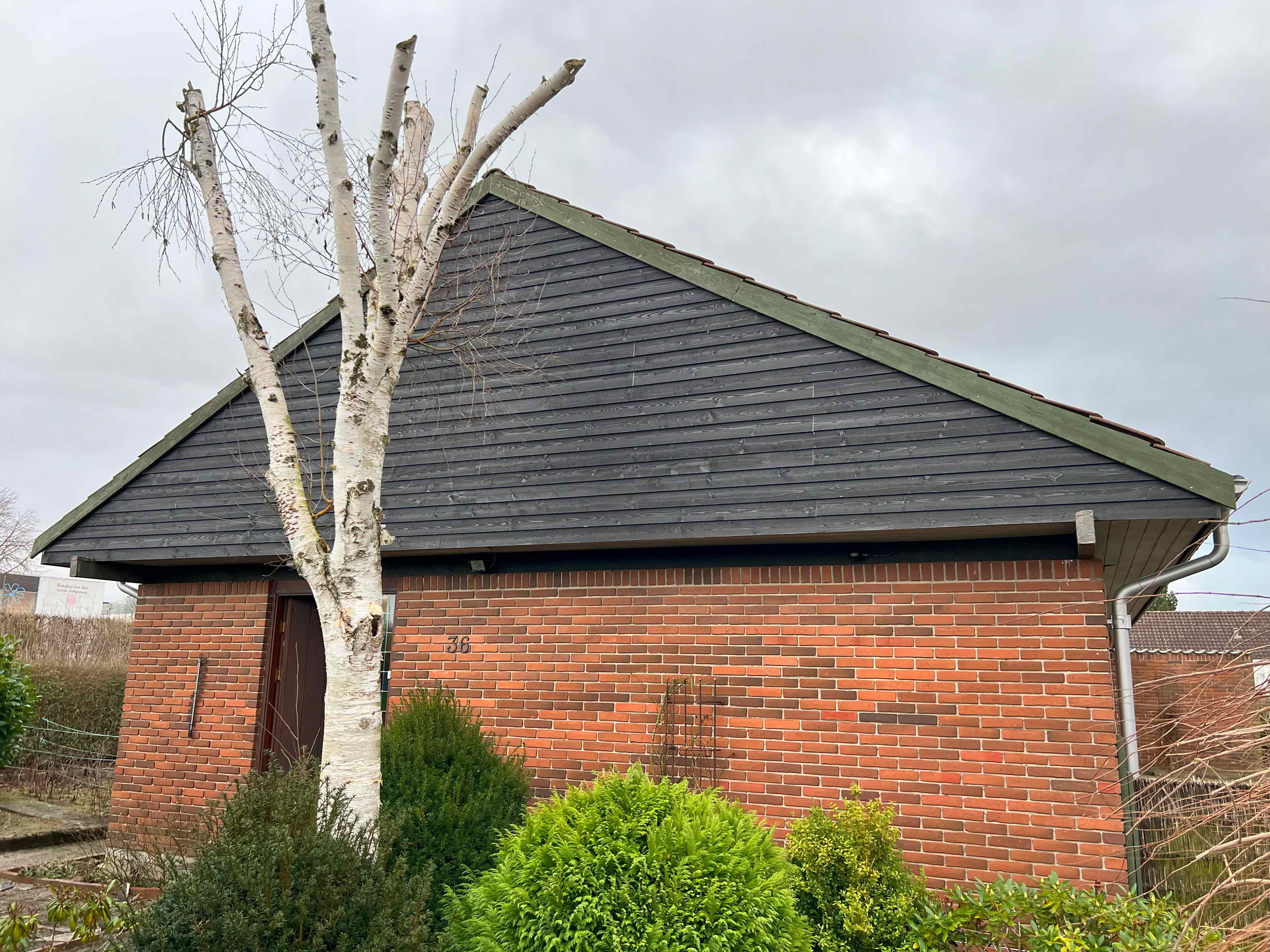 Nyt liv til husets gavl, renoveret af MogaByG for at fremstå som ny og tilføje værdi til boligen.